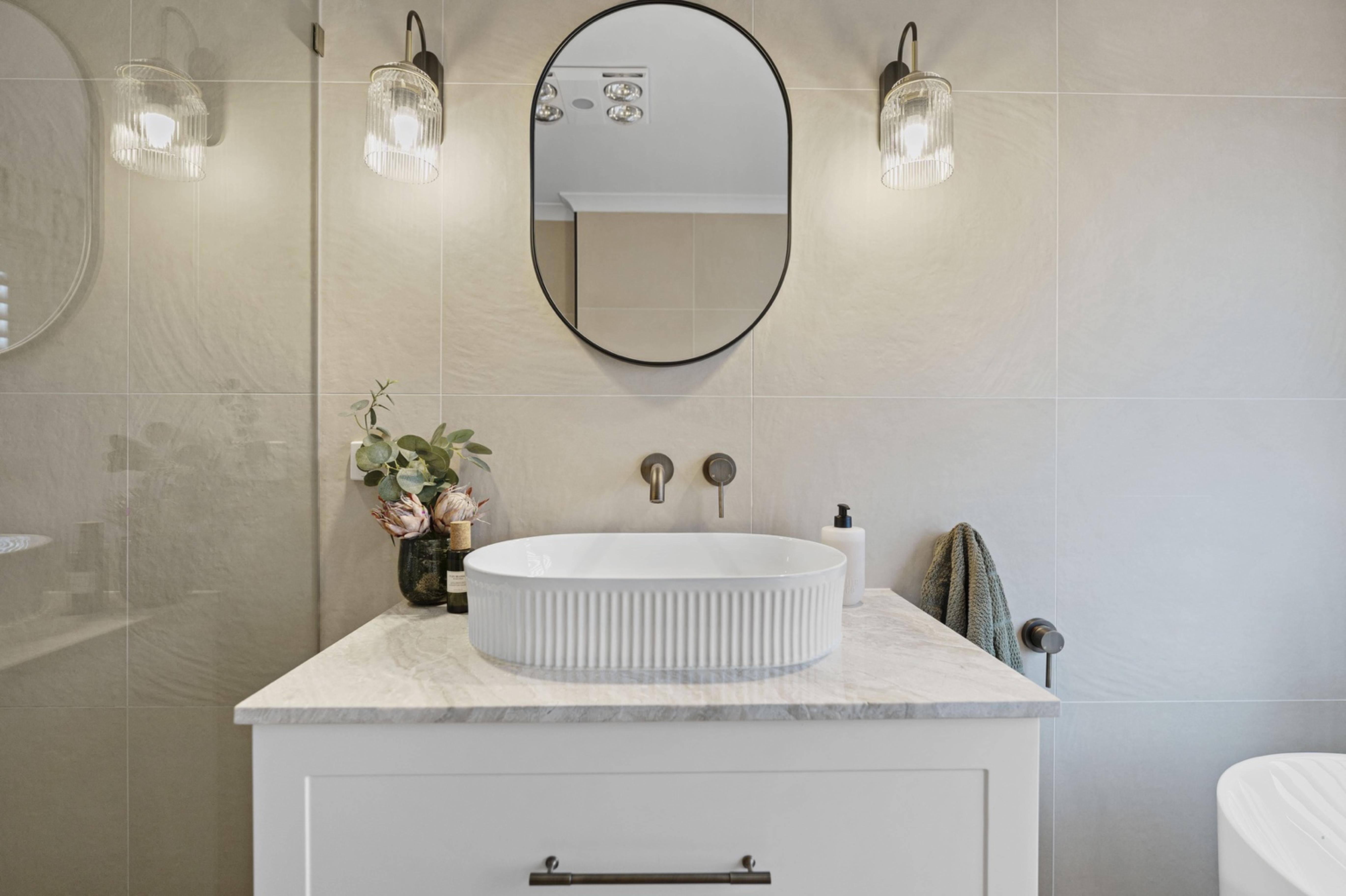 Luxury Bathroom Transformation with Antique Brass Fixtures