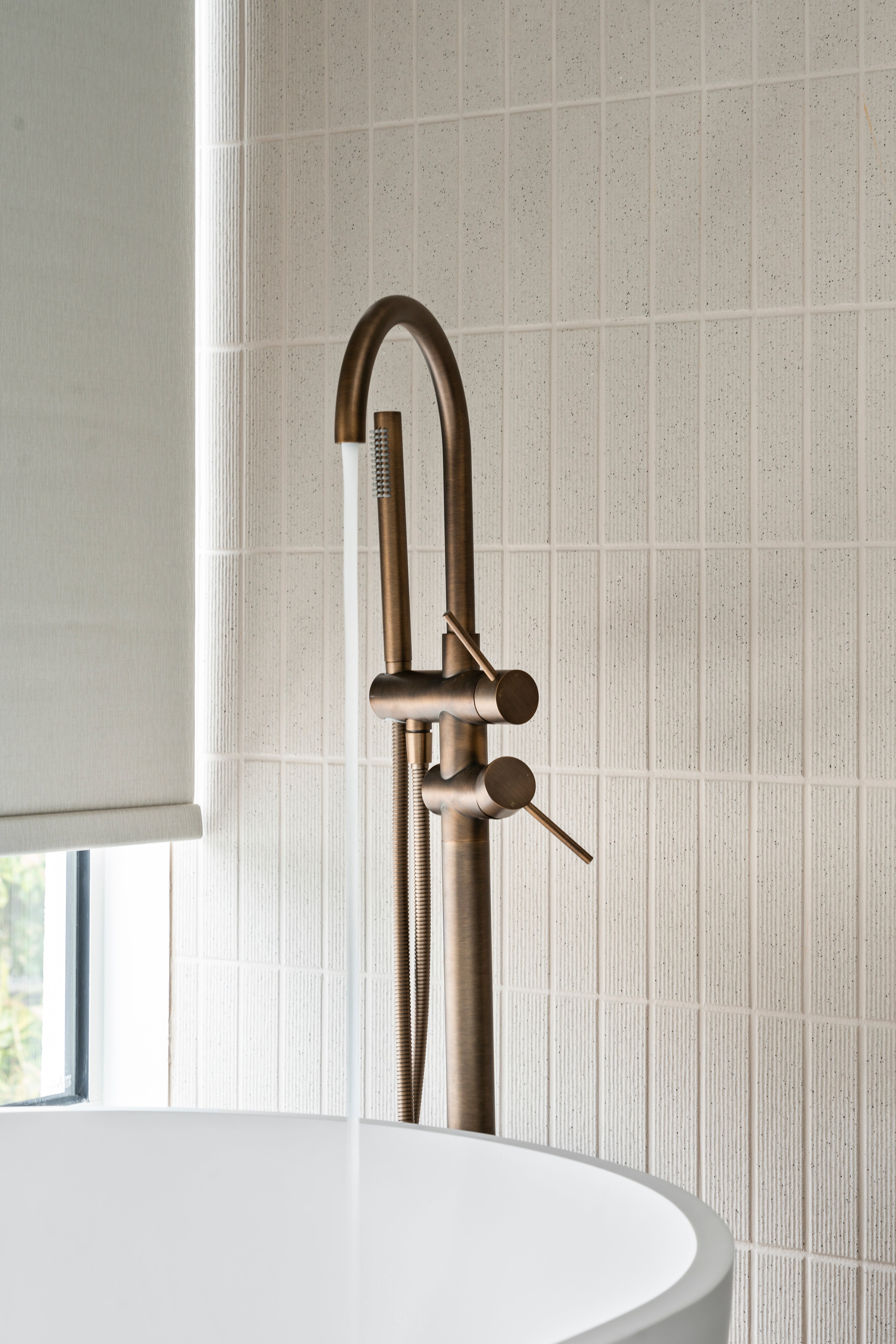 Haven Bath Filler with Hand Shower Wand - Antique Brass